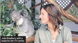  ??  ?? Julia Bradbury with a koala for her ITV series