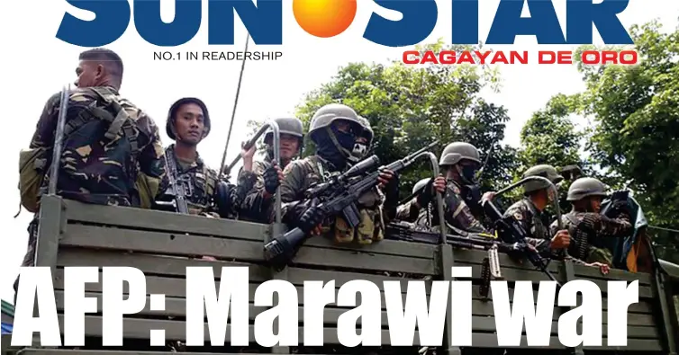  ??  ?? Government troops patrol the outskirts of Marawi city three days after Muslim militants lay siege in the city in southern Philippine­s Thursday, May 25, 2017. The exodus of thousands of residents has continued amid continuing gunbattle between...