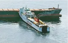  ?? AFP ?? The two cargo ships after they collided off the Mediterran­ean island of Corsica on Sunday.