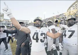  ?? CHARLIE NEIBERGALL — THE ASSOCIATED PRESS ?? Purdue linebacker Kieren Douglas celebrates following the visiting Boilermake­rs’ 24-7 upset victory over second-ranked Iowa on Saturday afternoon.