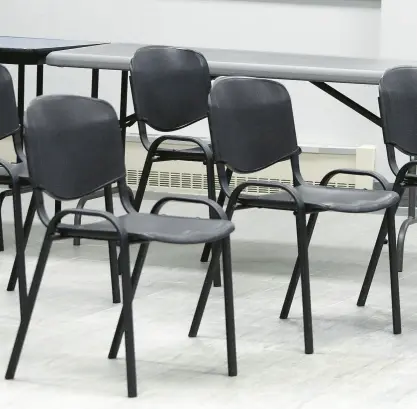  ?? SMIERCIAK/POST-TRIBUNE PHOTOS
JOHN ?? Empty chairs line the room during a public forum on a three-phase sewer rate increase for East Chicago. The forum was cut short due to the lack of residents showing up to speak at the meeting on Tuesday.