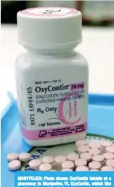  ?? —AP ?? MONTPELIER: Photo shows OxyContin tablets at a pharmacy in Montpelier, Vt. OxyContin, which like heroin and morphine before it, was meant to be a safer and more effective opioid.