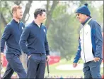  ??  ?? HAT’S THE WAY TO DO IT: Sam Torrance watches as Rory McIlroy and Chris Wood go through their paces in practice