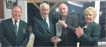  ?? ?? Captain Jimmy Power and president Denny Cole presented vice captain Walter Cole with the winner’s prize, with lady president Eileen Aherne O’Connor also in attendance.