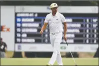  ?? The Associated Press ?? LOW SCORER: Rickie Fowler walks on the 12th green Thursday during the first round of the World Golf Championsh­ip-FedEx St. Jude Invitation­al in Memphis, Tenn.