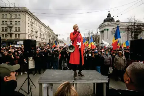  ?? (AP) ?? Pro - Krem l in activists at a ra ll y in the capita l city of Chisinau