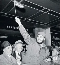  ?? PHOTO: PATRICK BURNS\NYT ?? ABOVE Cuban Prime Minister Fidel Castro leaves the hotel, where he was staying during his visit to New York, on April 21, 1959.