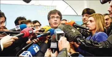  ?? JOHN THYS/AFP ?? Catalonia’s sacked leader Carles Puigdemont addresses a press conference after meeting with the speaker of the Catalan regional parliament in Brussels on January 24.