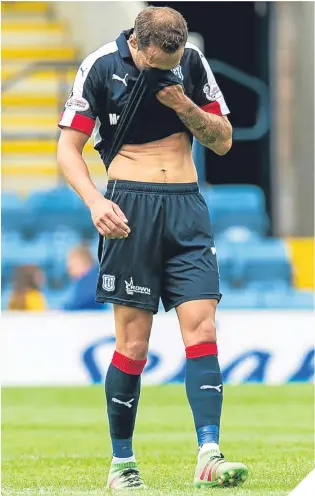  ??  ?? It’s not been a good season to date for Tom Hateley or Dundee.