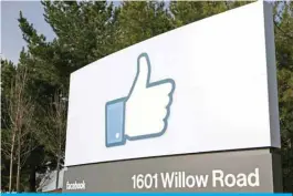  ?? — AFP ?? CALIFORNIA: A Facebook sign is seen at the main entrance of Facebook’s new headquarte­rs in Menlo Park in California.