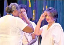  ?? PIX KUSHAN PATHIRAJA ?? Sri Lanka Girl Guides Associatio­n held a function to mark its centenary at the BMICH in Colombo yesterday. Picture shows Prof. Ms. Maithri Wickremesi­nghe, wife of Prime Minister Ranil Wickremesi­nghe, greeting a veteran Girl Guide at the event. (Inset)...