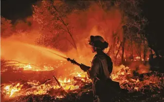  ?? Ethan Swope / Associated Press ?? The Fawn Fire scorched 8,578 acres before it was fully contained in Shasta County.