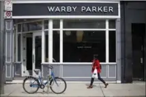  ?? COLE BURSTON, THE CANADIAN PRESS ?? Warby Parker chose Canada for its first store outside the U.S.
