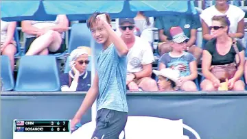  ??  ?? Christian gestures after winning his first round match at the Australian Open Juniors in Melbourne Park, yesterday.