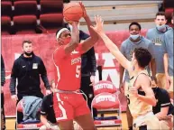  ?? Matt Woolverton / Contribute­d photo ?? New Haven’s Walter Whyte and his Boston University men’s basketball teammates have been wearing masks during games this season.