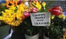  ?? Photograph: Neil Hall/EPA ?? Tributes to Ukraine decorate a monument to St Volodymyr the Greatm near Ukraine’s embassy in London, Britain, 10 March 2022.