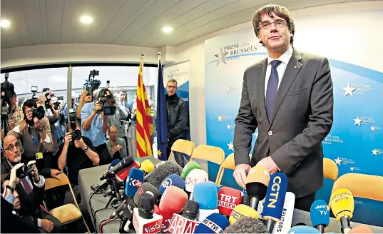  ??  ?? Carles Puigdemont, the sacked Catalonian president, held a press conference in Brussels, Belgium