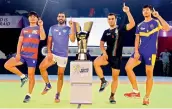  ??  ?? Captains of Korea, India, Iran and Thailand (from left) Hong Dong Ju, Anup Kumar, Meraj Sheikh and Thongkham Khomsan pose with the Kabaddi World Cup trophy in Ahmedabad on Thursday.