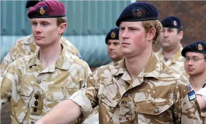  ?? Photograph: John Stillwell/ AFP/Getty Images ?? Prince Harry (right) marches before receiving a campaign medal for his army service in Afghanista­n in 2008.