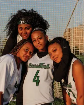  ?? ?? Zahria Liggans, 18, Alexia Carroll-Williams, 17, Kayla Carroll-Williams, 15, (center) and Deja Crenshaw, 18, are key members of the Cass Tech team. Photograph: Sylvia Jarrus/The Guardian