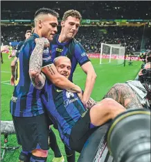  ?? AFP ?? Inter Milan defender Federico Dimarco celebrates with teammates after scoring his team’s first goal during Monday’s 2-0 home win over Empoli.