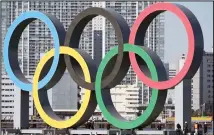  ??  ?? In this Dec 1, 2020, file photo, the Olympic Symbol is reinstalle­d after it was taken down for maintenanc­e ahead of the postponed Tokyo 2020 Olympics
in the Odaiba section in Tokyo. (AP)