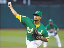  ?? Marcio Jose Sanchez / Associated Press ?? A’s pitcher Frankie Montas pitches in the first inning Friday. He has won all three of his starts, compiling an ERA of 1.25.