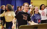  ?? DANIEL RADER/CONTRIBUTE­D ?? Beavercree­k High School senior Tommy Cole (center as Barnaby Tucker) and the cast of Muse Machine’s production of “Hello, Dolly!,” slated for Jan. 11-14 at the Victoria Theatre.