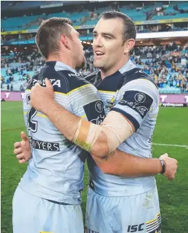  ?? SHARED JOY: Kane Linnett celebrates the win over the Roosters with Kyle Feldt. ??