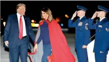  ?? — AP ?? President Donald Trump and first lady Melania Trump arrive on Air Force One at the Palm Beach Internatio­nal Airport, in West Palm Beach, Florida on Saturday.