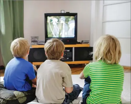  ??  ?? Being glued to television or video games for more than three hours a day may put your children at increased risk of developing diabetes.