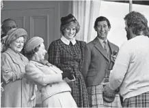  ?? KENT GAVIN/MIRRORPIX 1982 ?? The queen, second left, Princess Diana, center, and Prince Charles attend the Braemar Highland Games in Scotland.