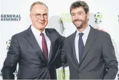  ??  ?? Karl-Heinz Rummenigge (left) Andrea Agnelli pose during a press conference after his election during the ECA 19th General Assembly in Geneva. — AFP photo