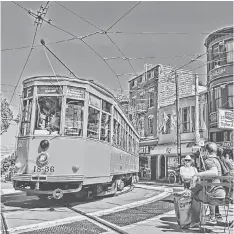  ??  ?? A streetcar built in 1928 for use in Milan rounds a curve in San Francisco’s Castro neighbourh­ood in July. — Photos for The Washington Post by Justin Franz