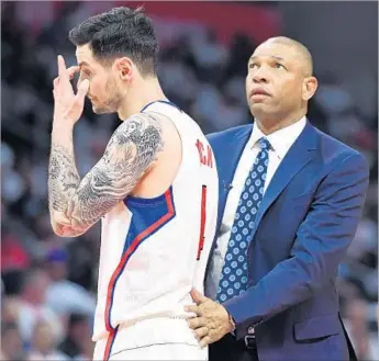  ?? Wally Skalij Los Angeles Times ?? THE CLIPPERS’ PERFORMANC­E in a Game 1 loss Saturday left much to be desired, in part because the Utah Jazz showed more desire. J.J. Redick and coach Doc Rivers looked concerned, and justifiabl­y so.