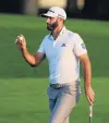  ?? PHOTO: TNS ?? On top of his game . . . World No 1 Dustin Johnson finishes on the 18th green during the third round of the Masters at Augusta National Golf Club yesterday.