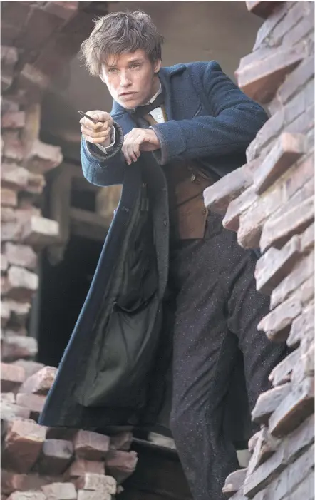  ?? — WARNER BROS. PICTURES ?? In Fantastic Beasts, Eddie Redmayne stars as Newt Scamander, an eccentric British wizard whose worldwide mission to rescue magical creatures brings him to 1920s New York City.