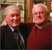  ??  ?? Incoming Laytown &amp; Bettystown Golf Club President for 2019, Jimmy Clynch, is congratula­ted by the outgoing president Tom Ryan.