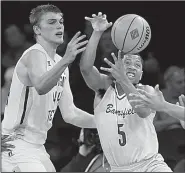  ?? AP/KATHY WILLENS ?? Cal State Bakersfiel­d guard Dedrick Basile (right) and Georgia Tech’s Ben Lammers fight for the ball during the men’s NIT semifinals Tuesday night at Madison Square Garden in New York. The Yellowjack­ets will play in the championsh­ip game Thursday after...