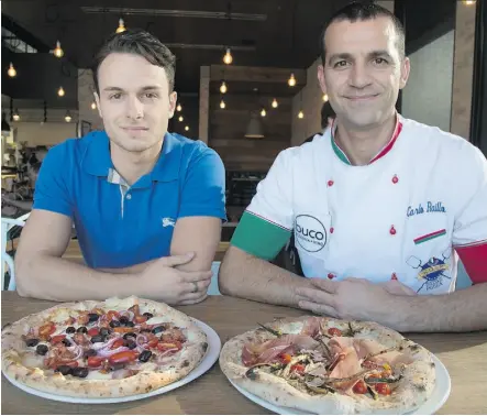  ?? PHOTOS: BRUCE EDWARDS/EDMONTON JOURNAL ?? Owner Antonio Rago, left, and chef Carlo Raillo show off some of the interestin­g pizza combinatio­ns they offer at Buco, in St. Albert.