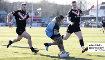  ??  ?? Albert Kelly touches down