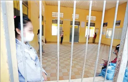 ?? HENG CHIVOAN ?? Workers are kept in quarantine at Hun Sen Champuvorn High School in Phnom Penh.