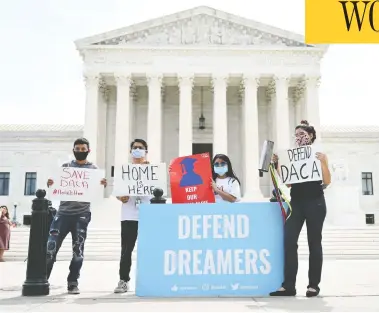  ?? JIM WATSON / AFP VIA GETTY IMAGES ?? People demonstrat­e outside the U.S. Supreme Court in June. On Saturday, a federal judge ruled a Trump appointee was not lawfully serving in his role when he issued new rules on the program that lets young migrants stay in the U.S.