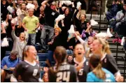  ?? Jeremy Stewart / Rome News-Tribune ?? Coosa fans cheer after the Lady Eagles capture a point during the second set of the Class AA state championsh­ip match against St. Vincent’s Academy on Saturday.