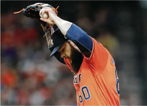  ?? Karen Warren / Houston Chronicle ?? Dallas Keuchel reacts after giving up a two-run home run to Oakland’s Mark Canha in the seventh inning. Keuchel gave up six runs in seven innings.