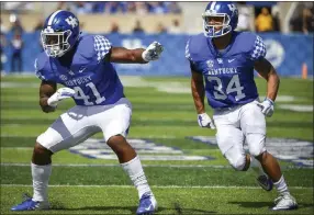  ?? Bryan Woolston The Associated Press ?? Kentucky linebacker Josh Allen (41) leads the Southeaste­rn Conference with 10½ tackles for loss and six sacks. Allen’s unbeaten Wildcats are a 6-point underdog at Texas A&amp;M.