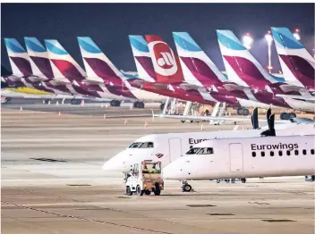  ?? FOTO: DPA ?? Eurowings hält mehr Reserveflu­gzeuge bereit und hat Puffer in den Flugplan eingebaut. Doch auch im Juni war mehr als jeder vierte Flieger verspätet.