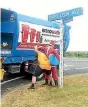  ?? PHOTOS: SUPPLIED ?? The man in red is promoting gender equality, Santa’s helper says, but he also regularly fires up the barbie and prepares to go boogie-boarding.