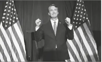  ?? ANDREW HARNIK/AP ?? VIRGINIA GOV.-ELECT GLENN YOUNGKIN arrives to speak at an election night party in Chantilly, Va., early Wednesday after he defeated Democrat Terry McAuliffe.