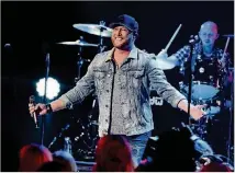  ?? KEVIN WINTER / GETTY IMAGES ?? Country singer Cole Swindell will perform Thursday night at Infinite Energy Arena.